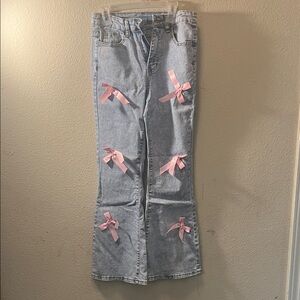SHEIN Light Blue Jeans with Pink Bow Accents